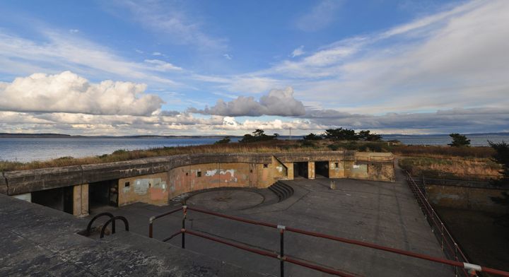 A decrepit and long disused Navy battery, brick and concrete.