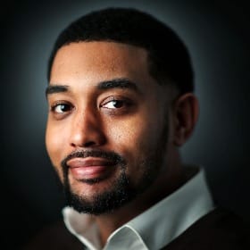 Headshot of a man with a beard