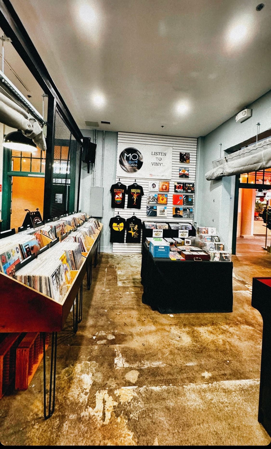 A store with records, t-shirts and cds for sale