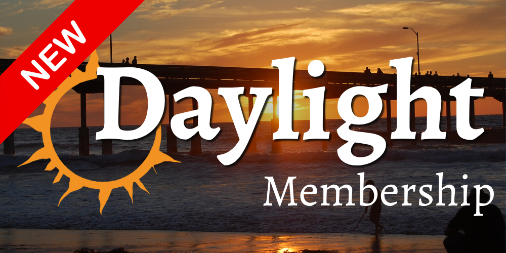 Image of a sunset behind a pier at the beach with the words "New Daylight Membership"