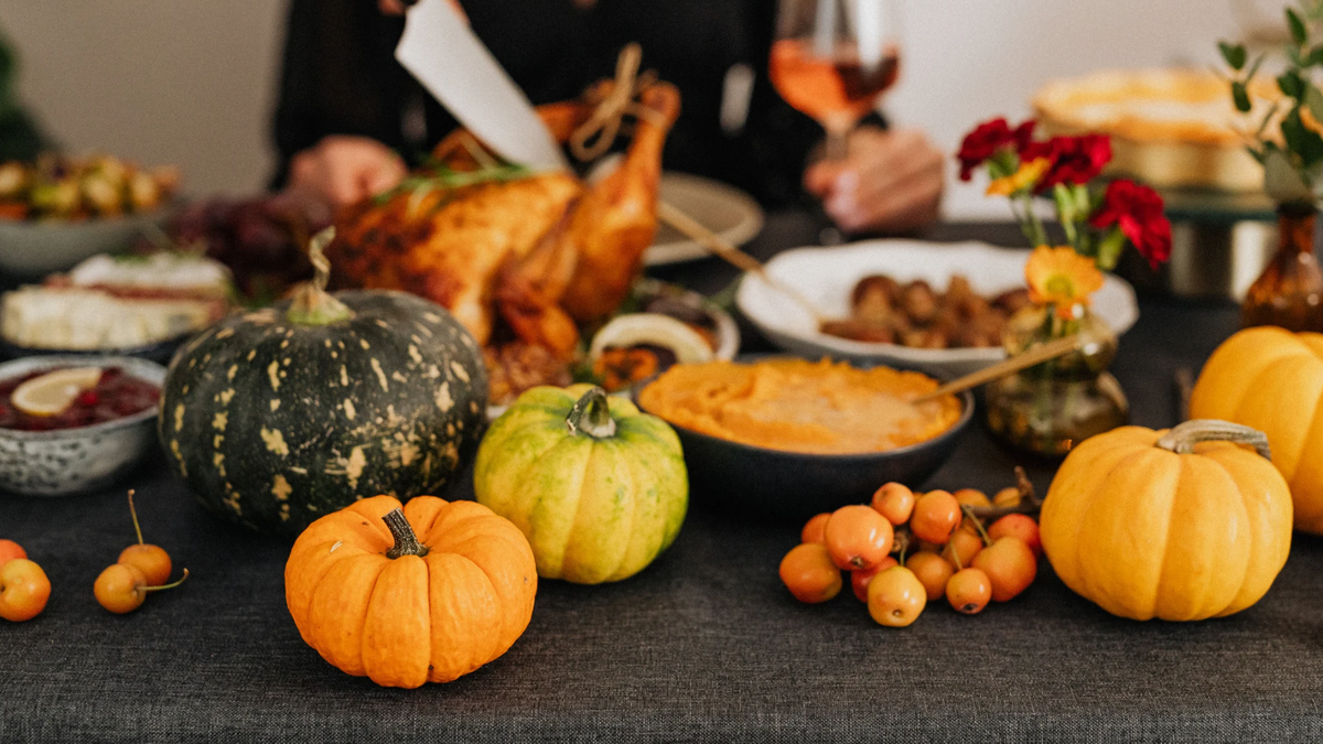 Picture of a Thanksgiving dinner spread on a table