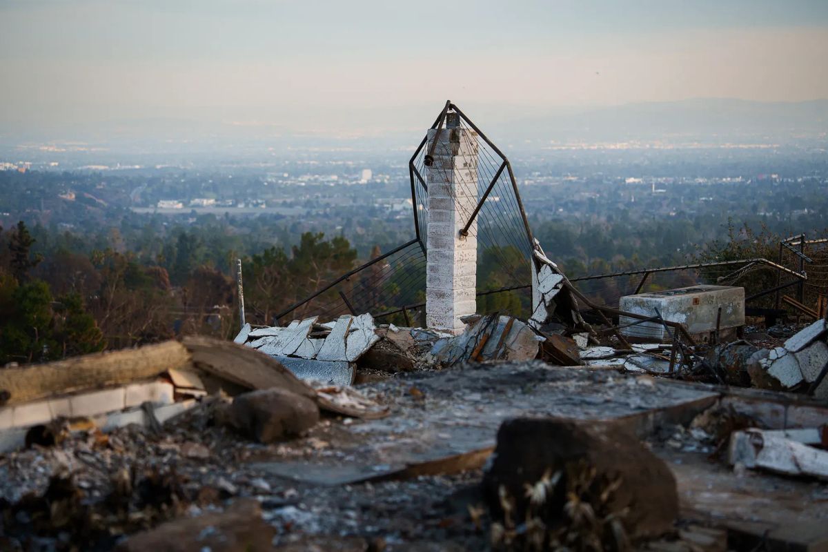 A burned building at the top of a hill
