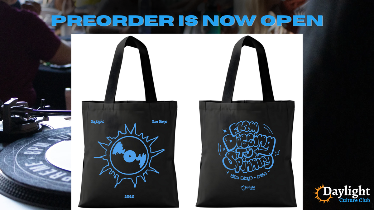 Picture of a DJ booth with images of a black tote bag with blue design that says "Daylight San Diego" with a record on one side, and "From digging to spinning" on the other