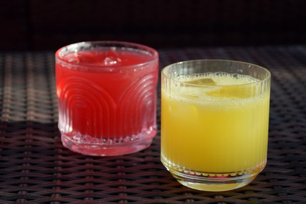 A picture of a red and yellow cocktail