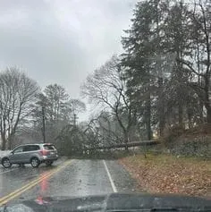 Floods and downed power lines plague residents