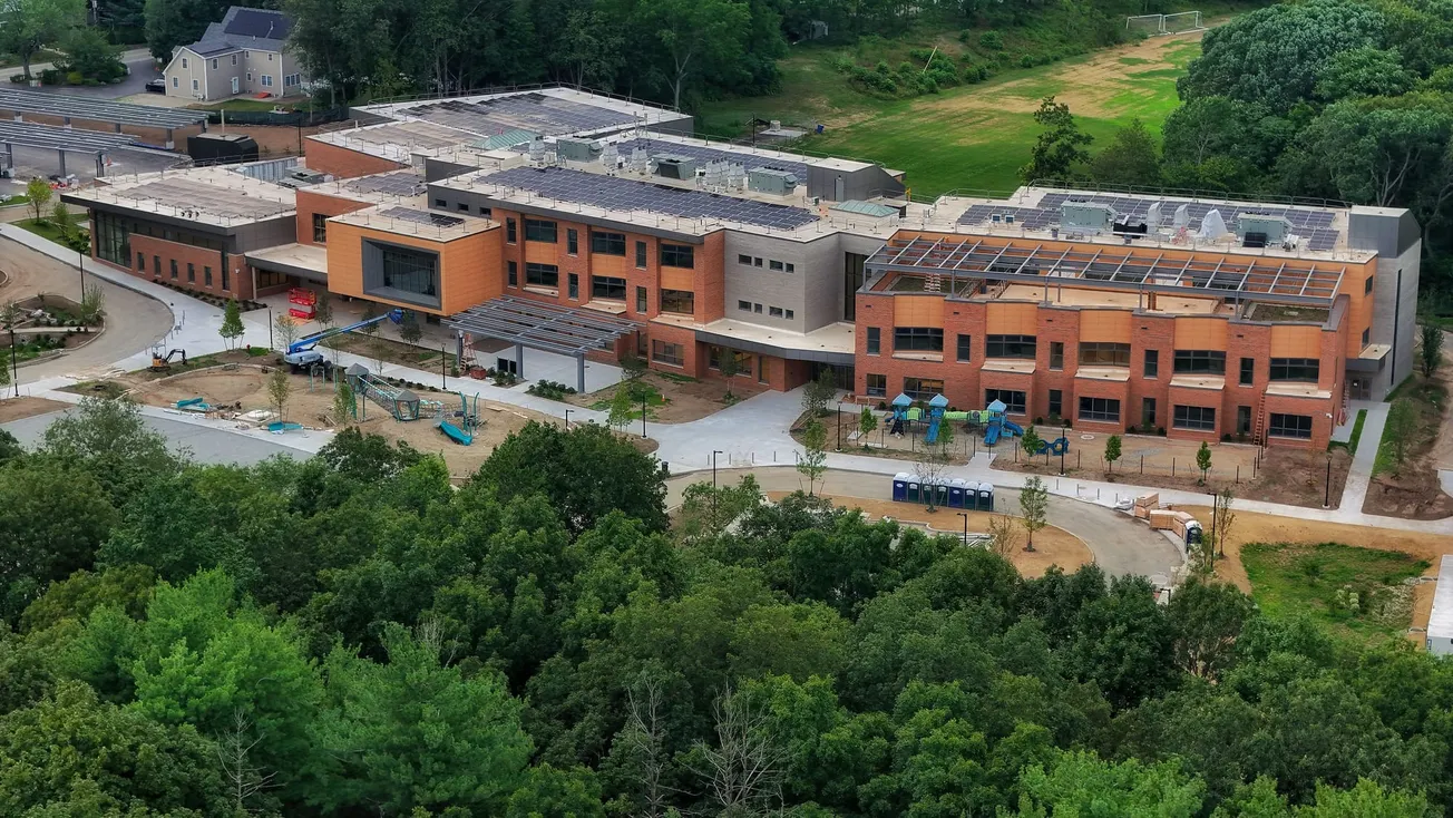 Lynch School solar panels in place, building continues to rise