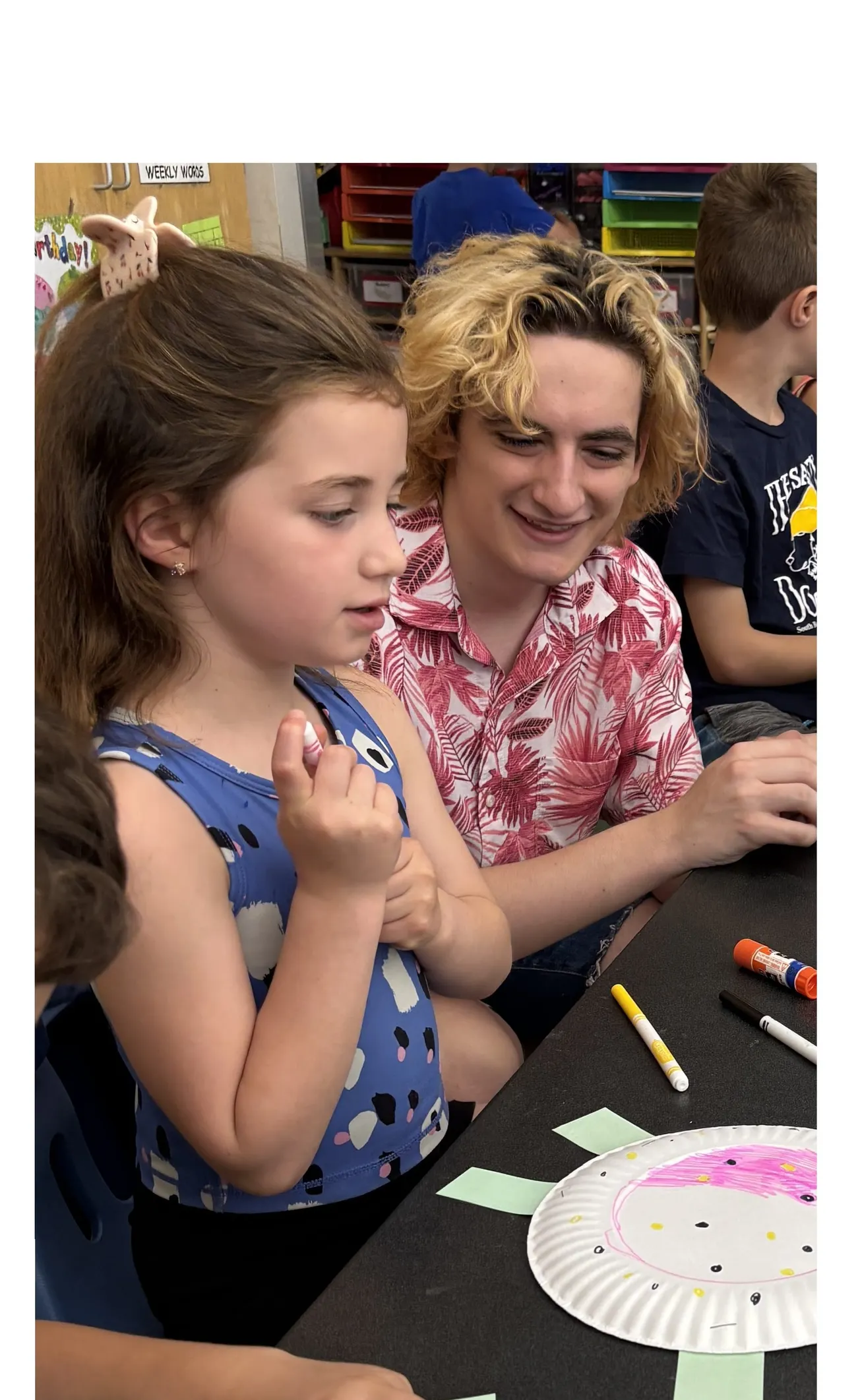 Winchester High School students teach first-graders about Galapagos tortoises