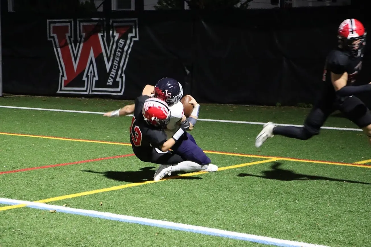 Winchester football loses competitive battle to host Melrose
