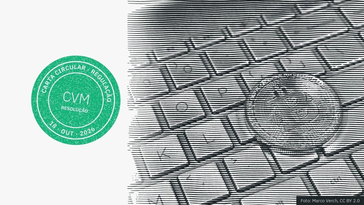 Moeda de bitcoin sobre um teclado, em gravura, com o carimbo CVM · Resolução