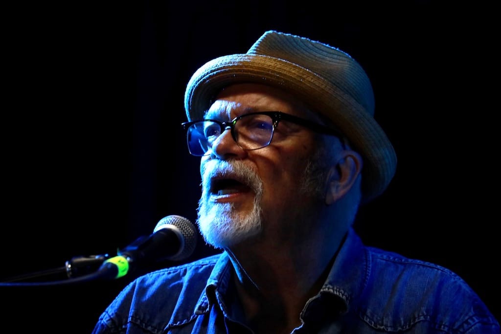 Phil Madeira singing on stage