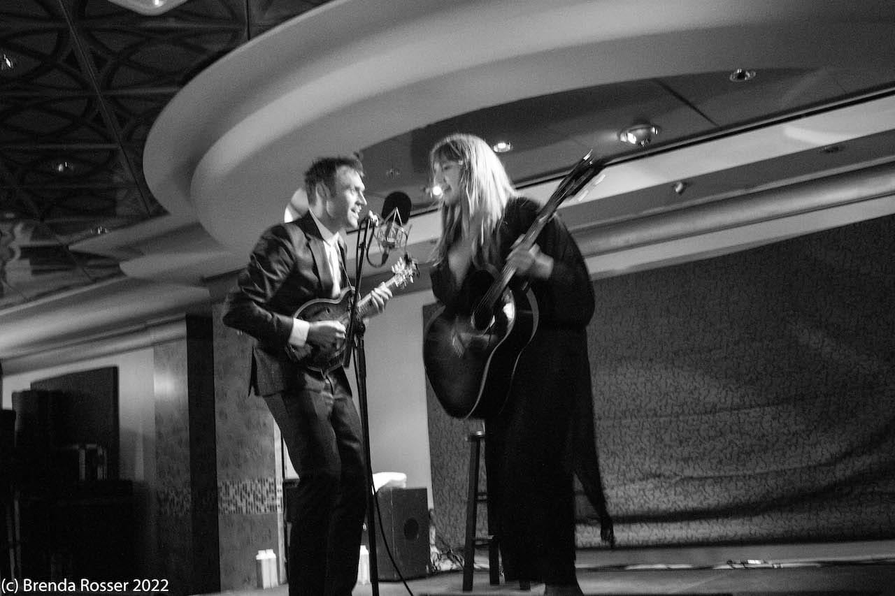 Madison Cunningham and Chris Thile perform on stage