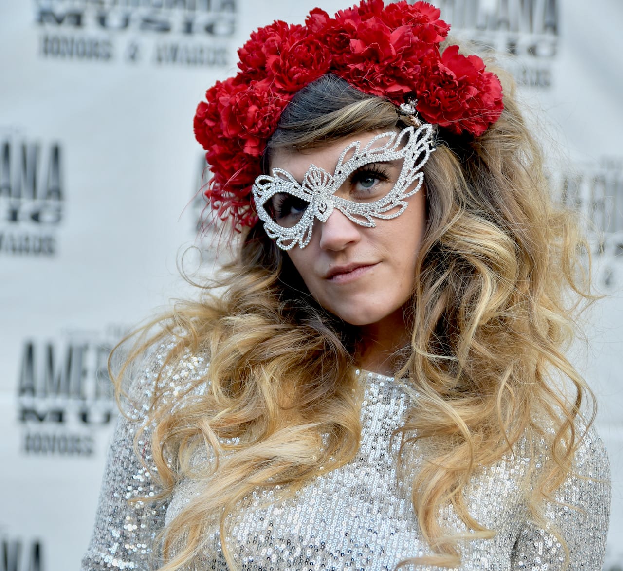 Sierra Ferrell in flower crown and silver glasses