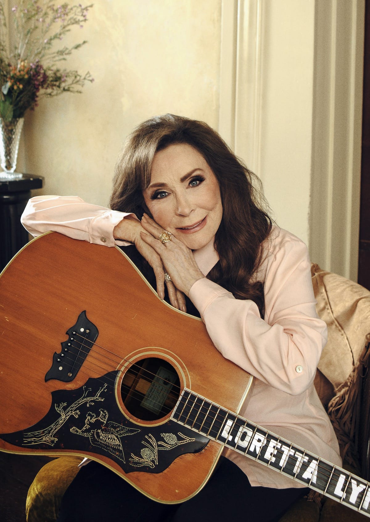 Loretta Lynn with acoustic guitar