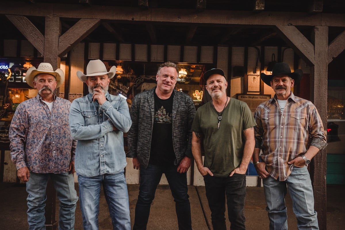 Group photo of the five men in The Great Divide