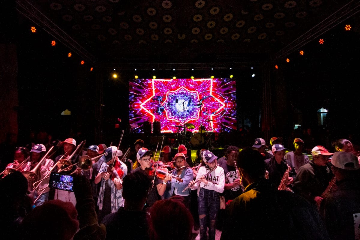 Students from the Guillermo&nbsp;Tomas&nbsp;Music Conservatory open for Trombone Shorty & Orleans Avenue from the floor right in front of the stage at Los Jardines de la Tropical.