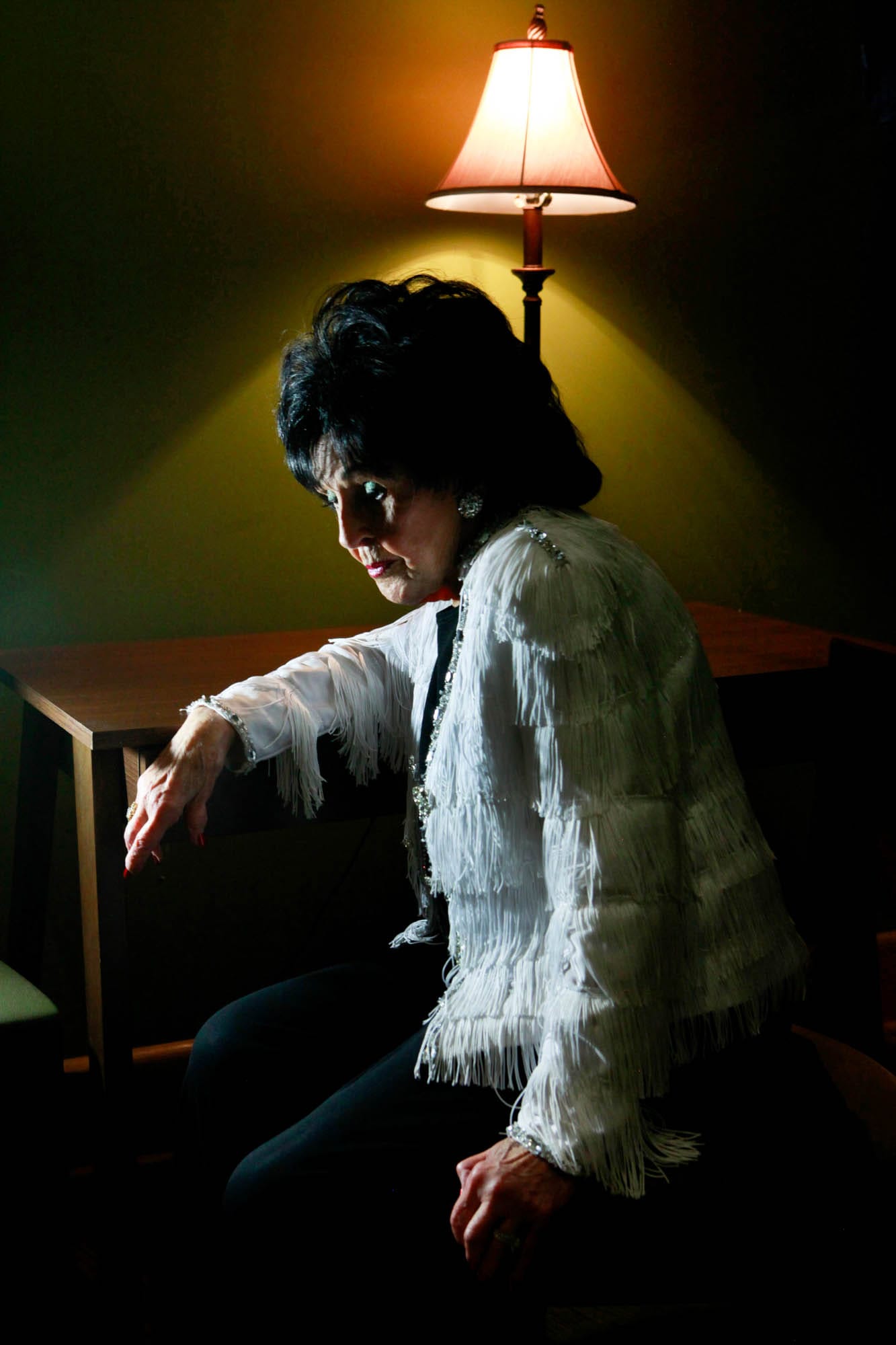 Wanda Jackson backlit by a lamp