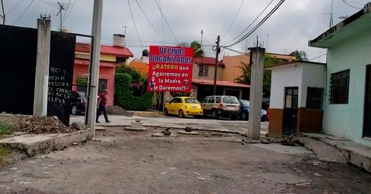 Colocan lonas de advertencia para delincuentes