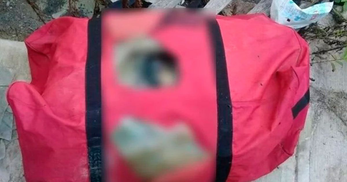 Abandonan cuerpo en maleta