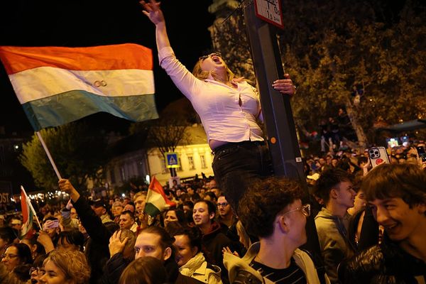 Revellers celebrate the resounding Tisza party win in Hungarian parliamentary elections on April 12, 2026 in Budapest, Hungary