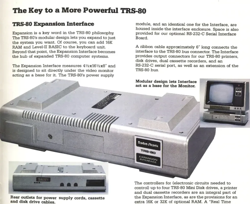 Page from a Tandy/Radio-Shack catalog highlighting the TRS-80 "Expansion Interface". It is in silver plastic and is large enough and strong enough to function as a monitor stand. The description specifically reads, "Modular design lets Interface act as a base for the Monitor."