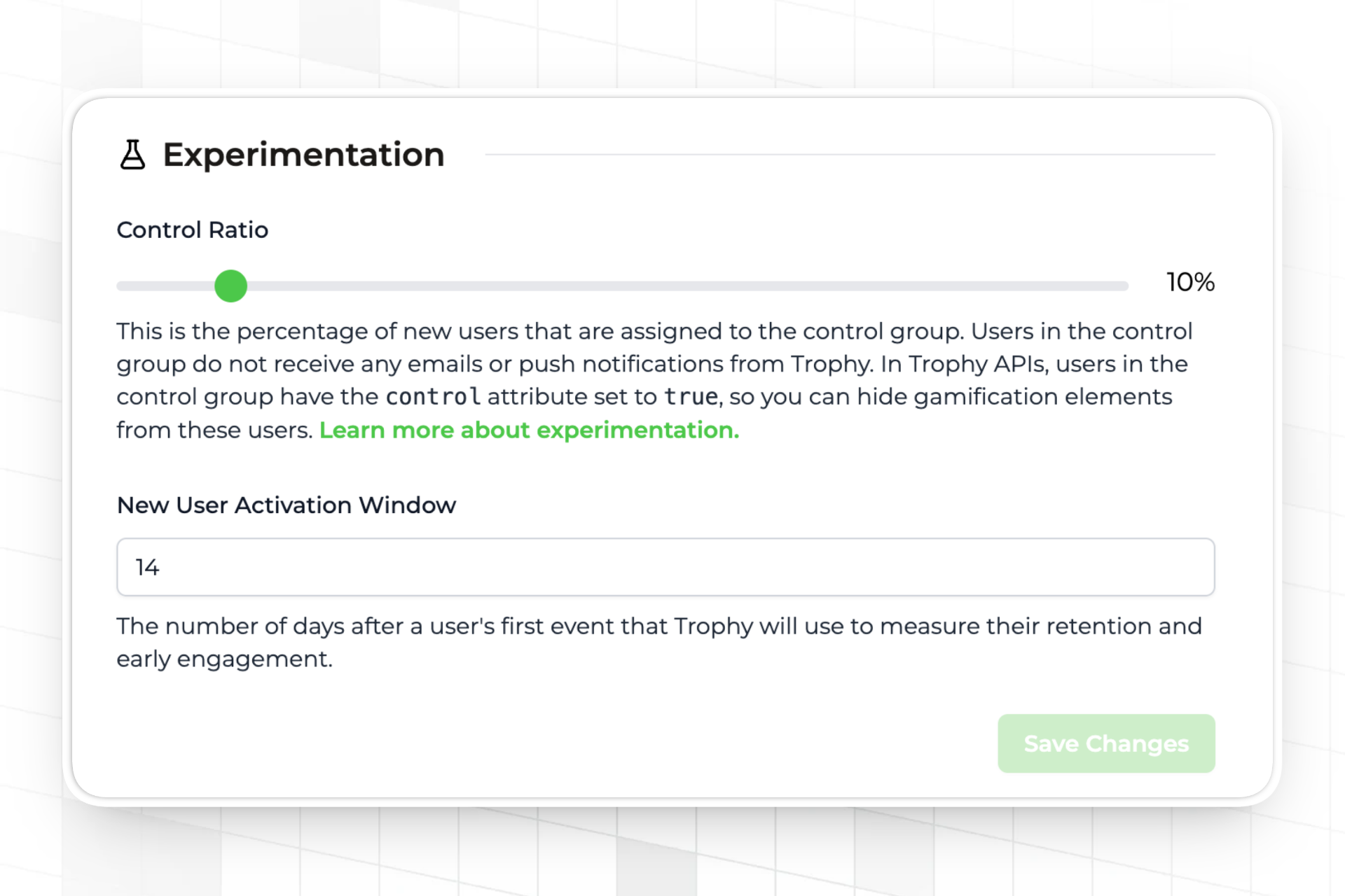 Trophy integration page showing the control ratio slider set to 10%, alongside the analytics dashboard displaying side-by-side retention curves for control and experimental user groups.