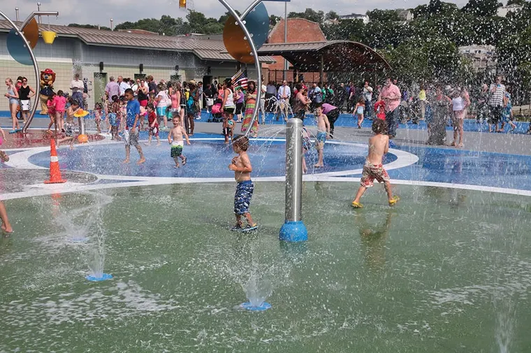 Kids playing in a splash pad