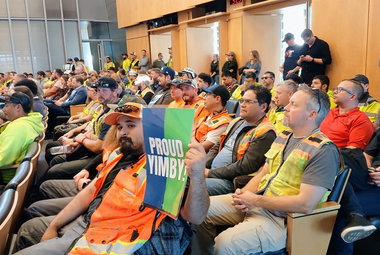 Housing Advocates, Workers Pack City Hall to Support Temporary Fee Break