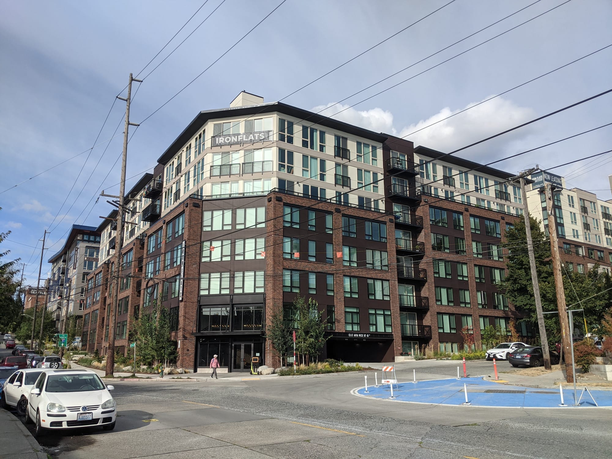 One of three buildings of the Iron Flats apartments, a second building peeks out of the right.