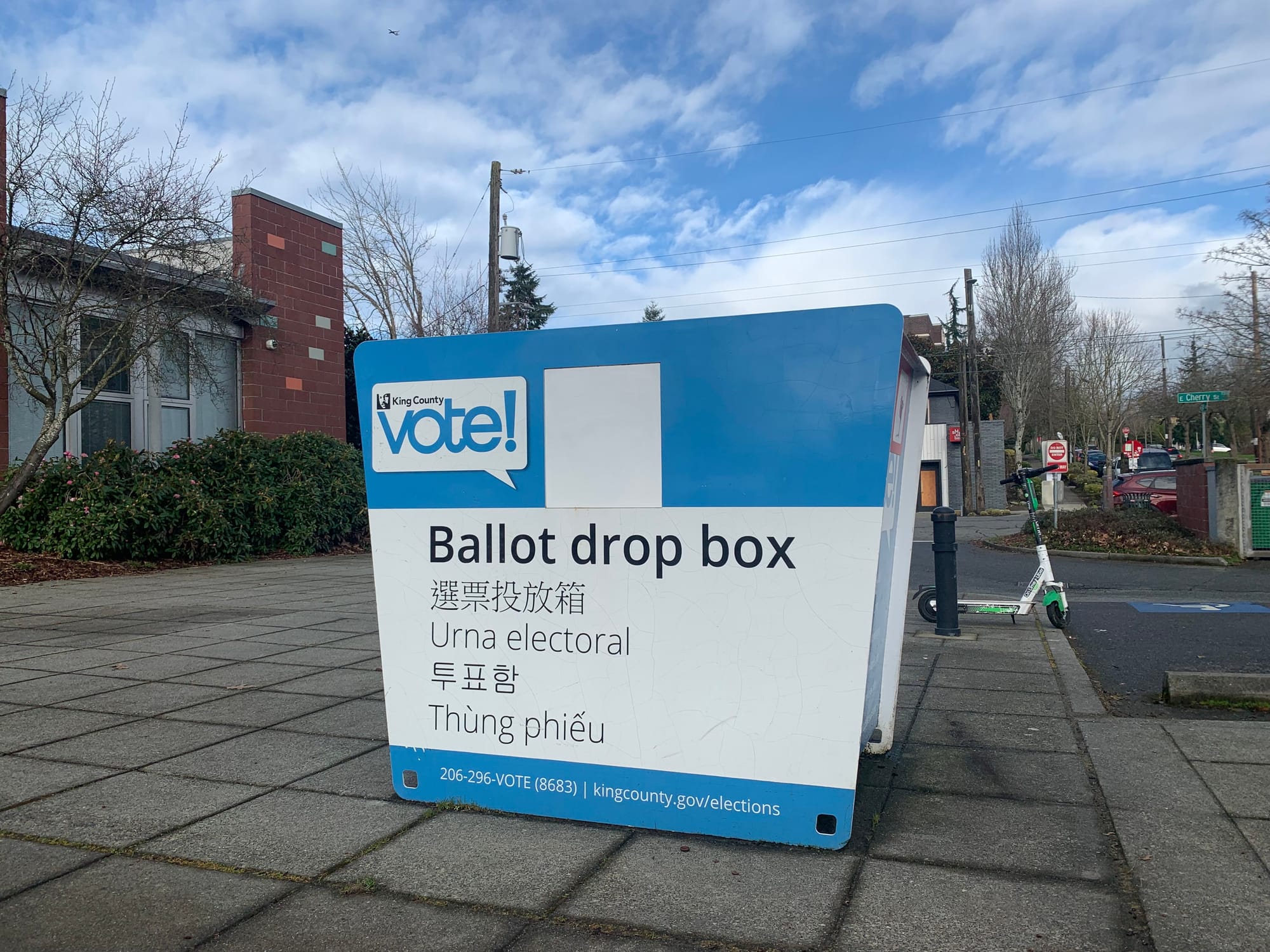 A photo of King County ballot drop box on a sunny day.
