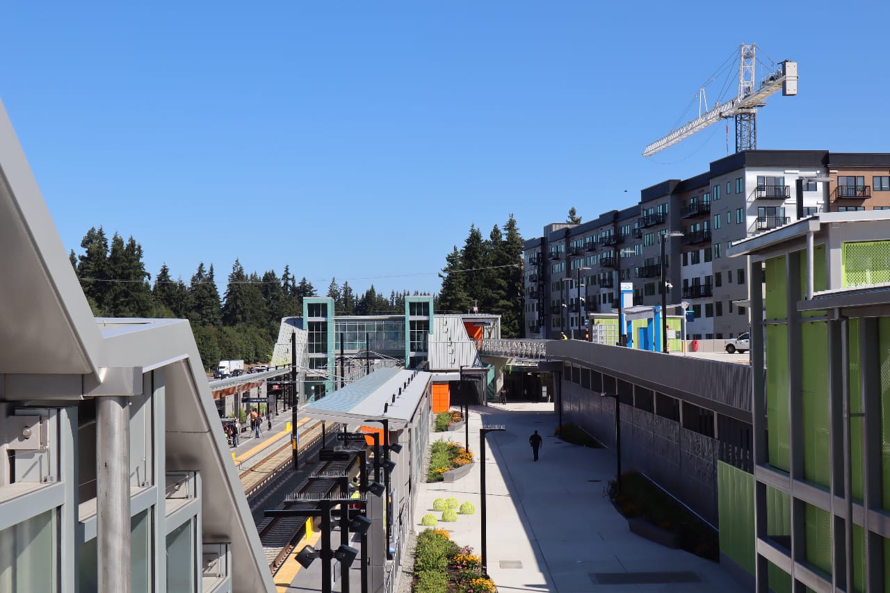 Shoreline North 185th Street station from the platform with an apartment building under construction