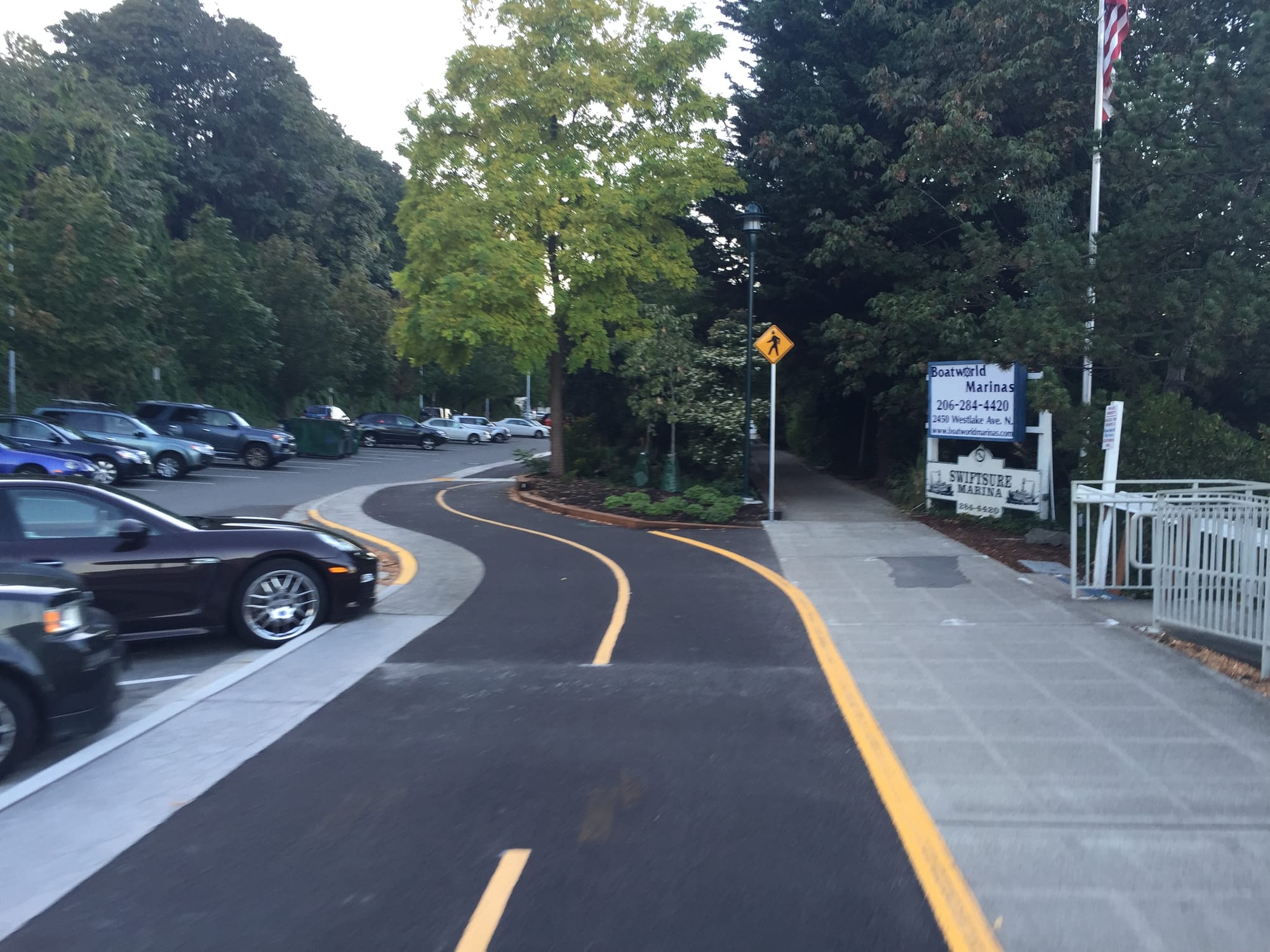 Where the cycletrack bends around a landscape area.