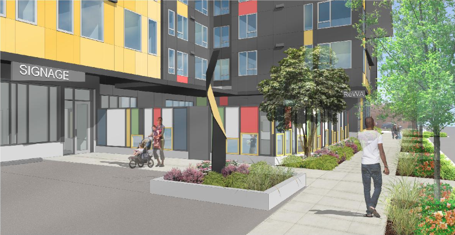 The play area is surrounded by a colorful fence with playful windows. (LIHI)