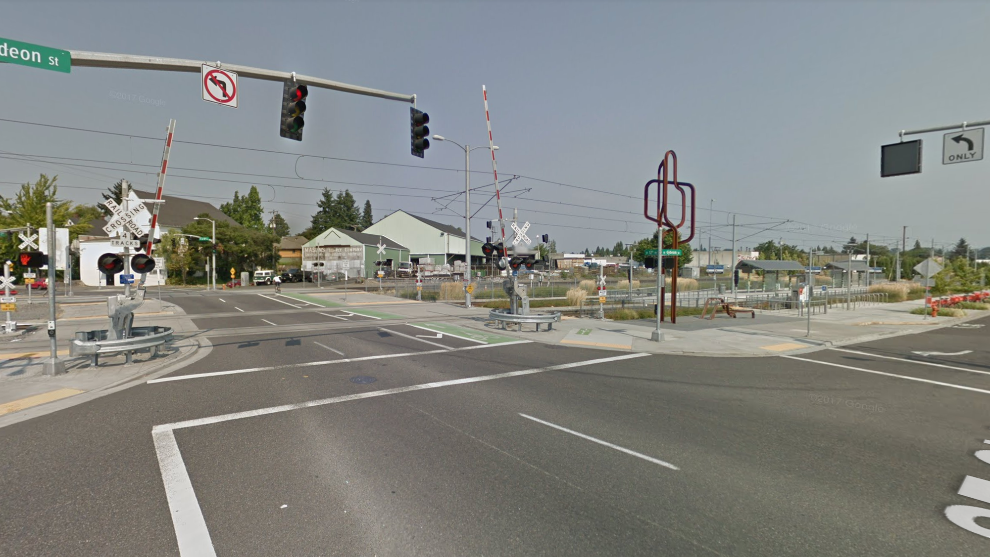 Example of at-grade Trimet MAX Orange Line crossing in Portland with protective crossing gates. (Google Maps)