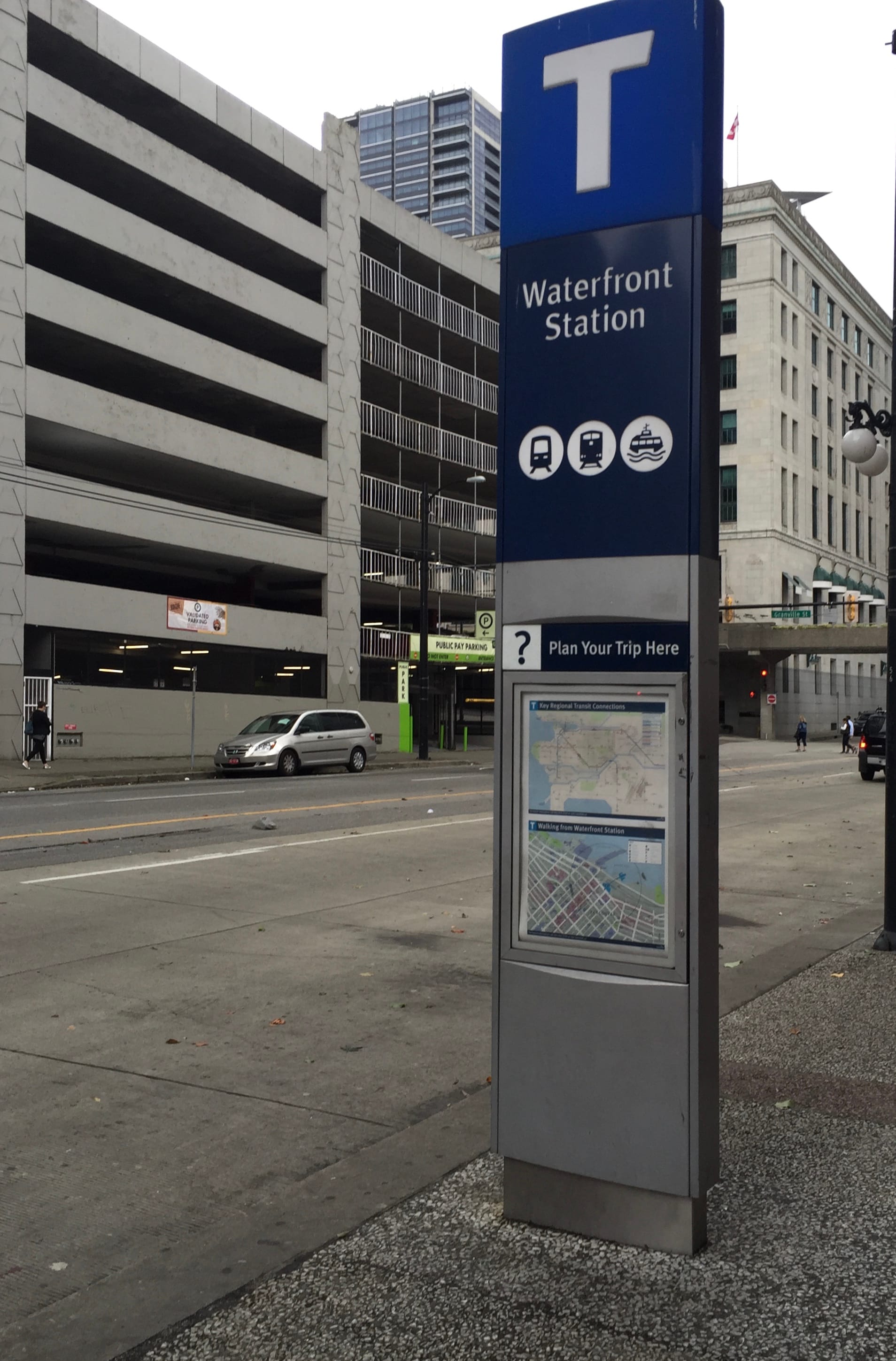 A TransLink transit totem outside Waterfront Station, a major SkyTrain, SeaBus, West Coast Express, and bus terminal, in central Vancouver, British Columbia.