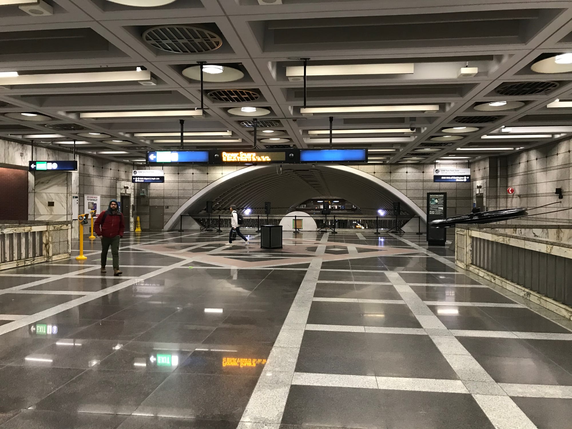 The smaller southern mezzanine at Pioneer Square Station looking north.