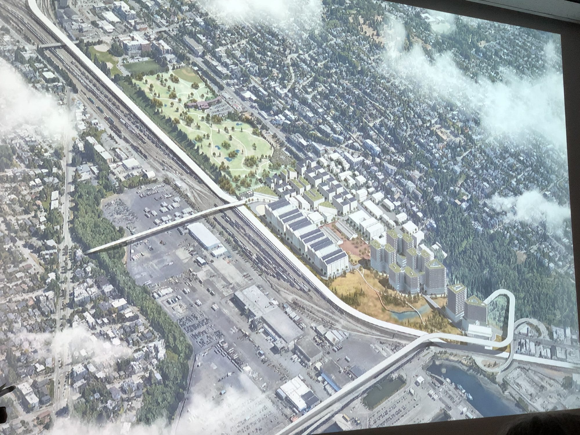 
                     Rendering of residential towers and mixed industrial maker space with proposed salt water marsh. BE 405/505 project group “Ur
                     