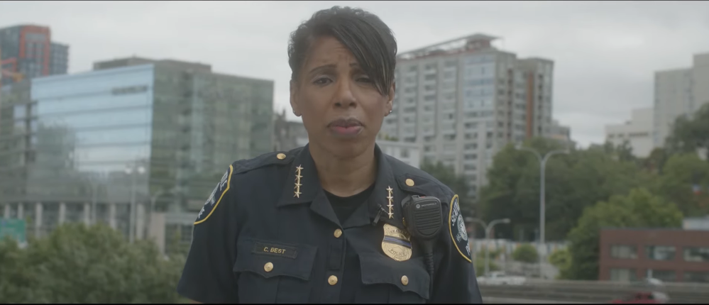 
                     Chief Best with a Downtown Seattle buildings and street behind her. Video is here: https://www.seattle.gov/police/together
                     