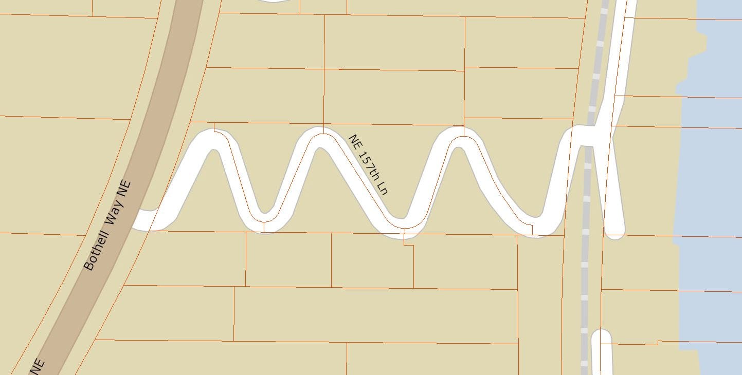 NE 157th Ln squiggles to climb the hill to Bothell Way NE creating some triangular lots.