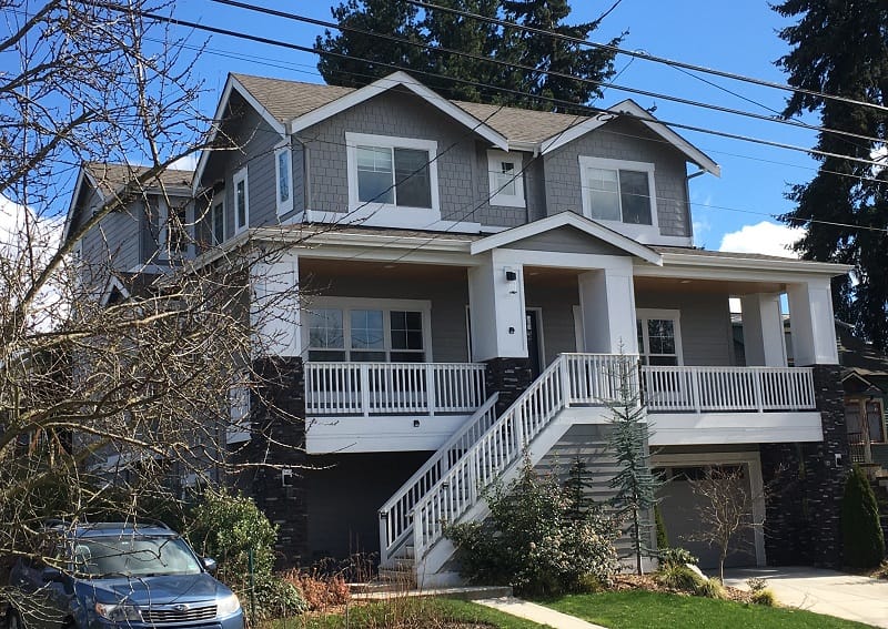 A very large and boxy three-story house in Wallingford.