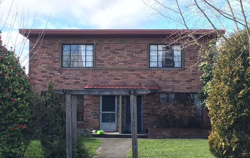 A two-story brick duplex in Wallingford.