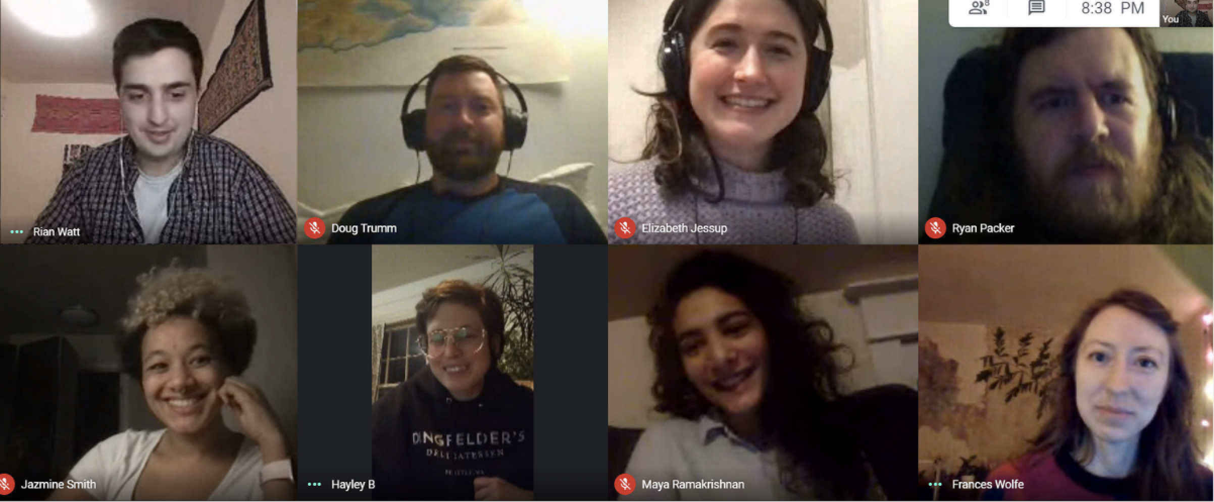 All eight members stacked in a video split screen, mostly smiling and looking cute.