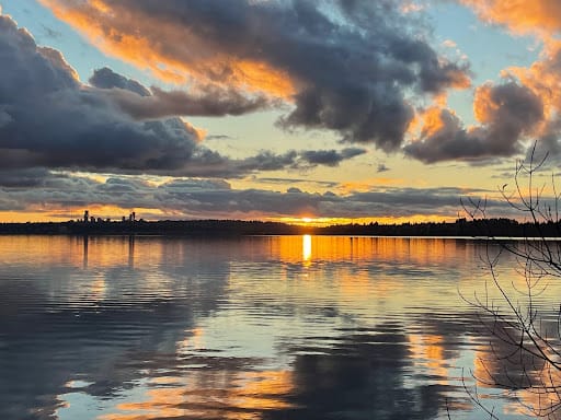 A photo of a colorful sunset over water