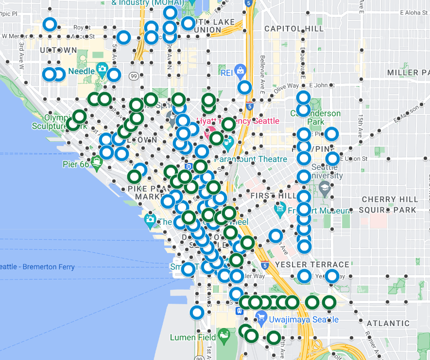 A map of blue and red circles showing where right turn on red signage will be deployed and where it already is