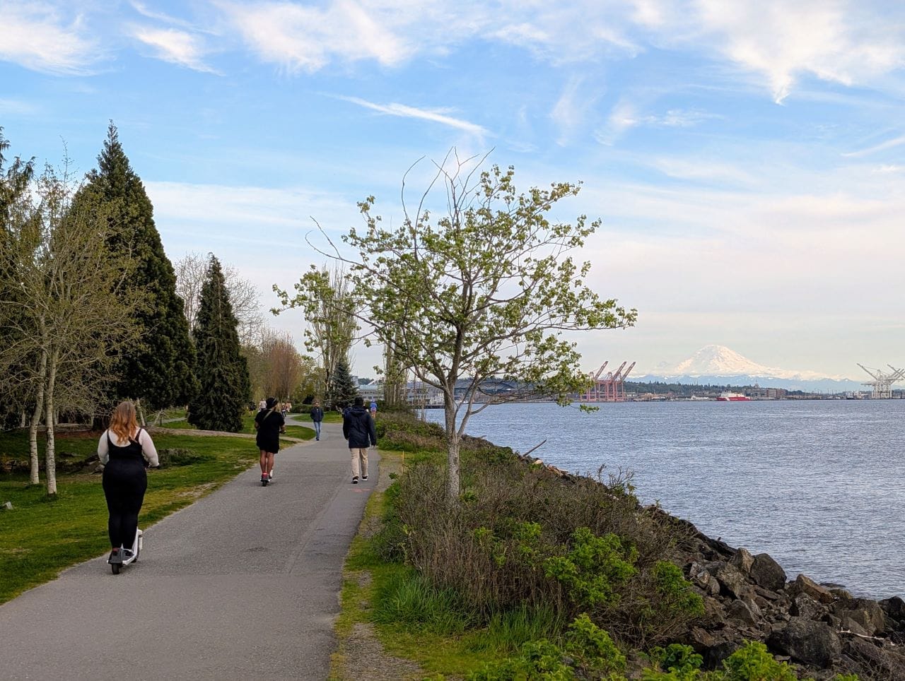Mount Rainier looms in the distance off Elliott Bay with the view east along the waterfront trail.