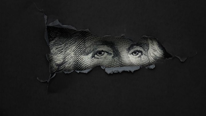 George Washington looking throuth a hole