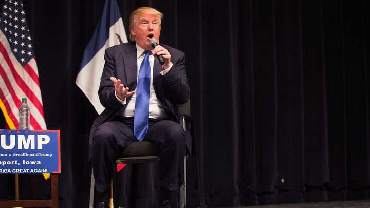 Trump seated at rally