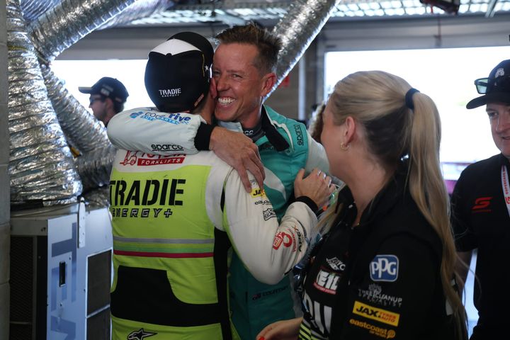 HOT SHOTS: Man hugs.