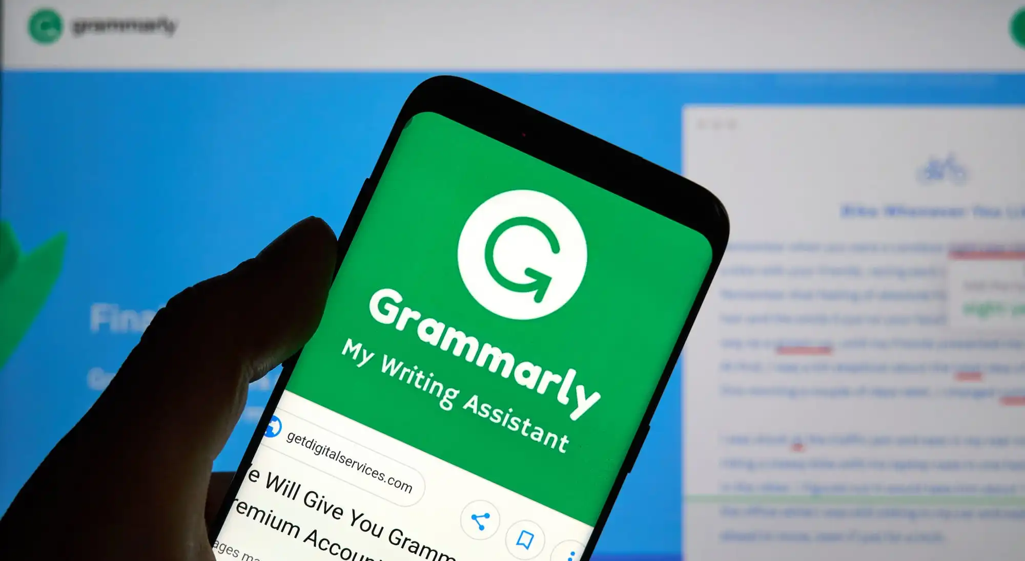 Phone on which the Grammarly website is open