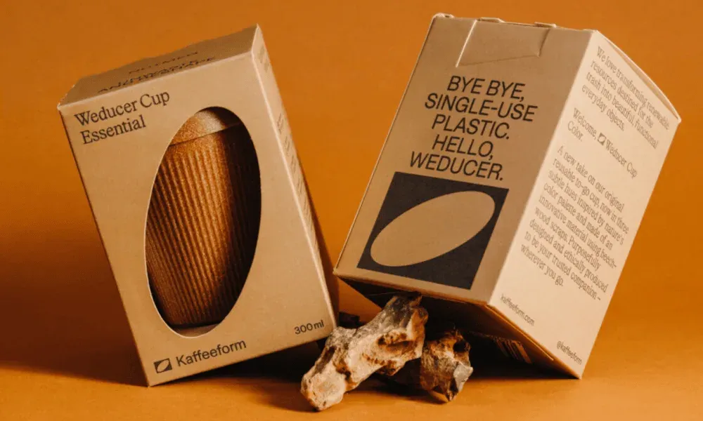 Weducer Cup ad, eco-friendly 300ml cup, orange background