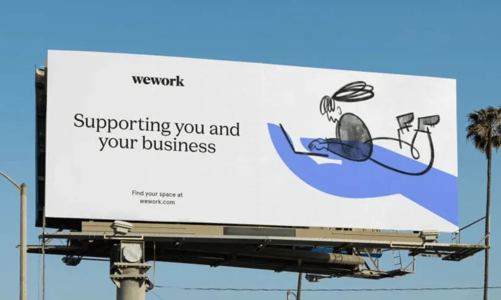 WeWork ad with person on laptop, promoting business support
